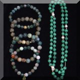 J07. Malachite necklace and stone bracelets. 